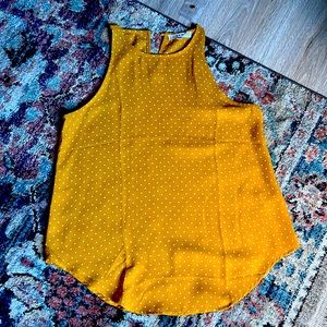 E&M yellow polka dot flowy tank.